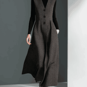 Elegant women's wide-leg jumpsuit with tailored waist and button details, ideal for stylish fashion statements.